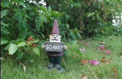 Gnome Holds Go Away Sign 4.4x3.4x9.3