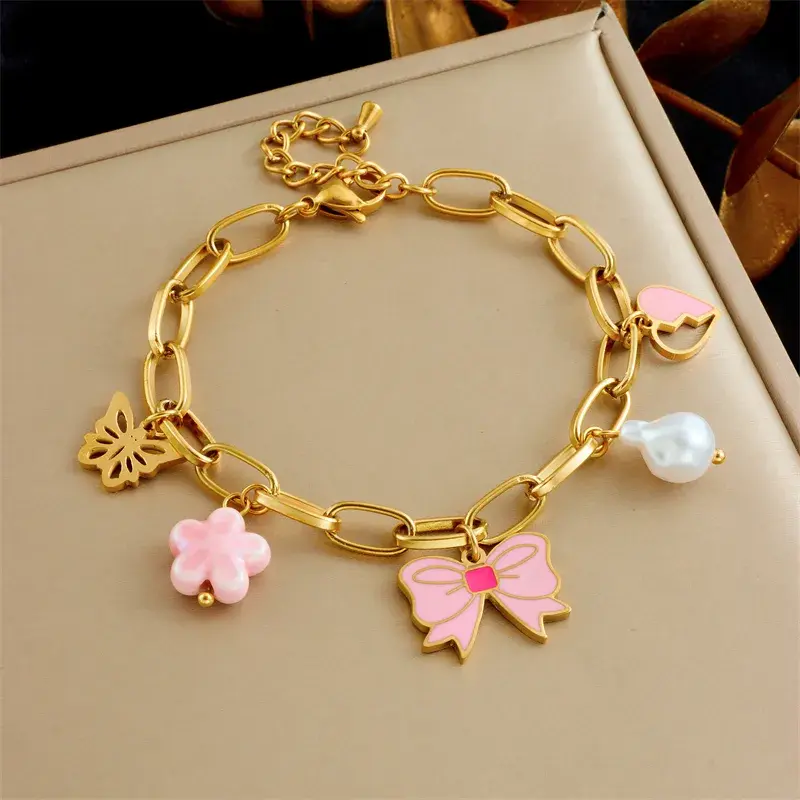 Dutch Growers Pendant Charm Bracelet Pink Bow Gold