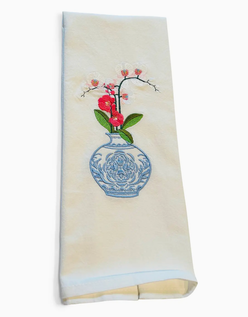 VIBRANTLY BLUE EMBROIDERED HAND TOWEL-BLUE AND WHITE JAR WITH ORCHID