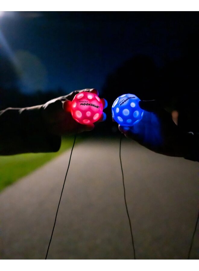 Waboba Moonshine Light Up Moon Ball on a leash