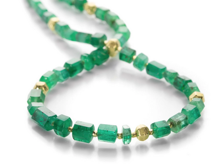 Necklace; 17" long emerald crystal bead necklace, 59.39 ctw, with tiny gold spacers between each, 8 small lantern shaped gold beads, and a toggle clasp.