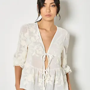 Apricot Embroidered Peplum Top