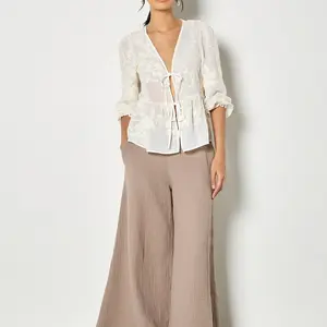 Apricot Embroidered Peplum Top