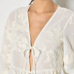 Apricot Embroidered Peplum Top