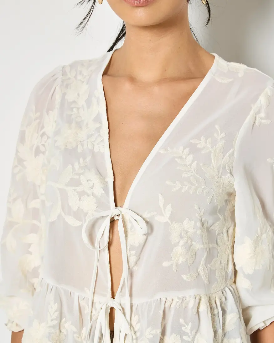 Apricot Embroidered Peplum Top