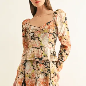 Adelyn Rae Sylvie LS Peplum Top