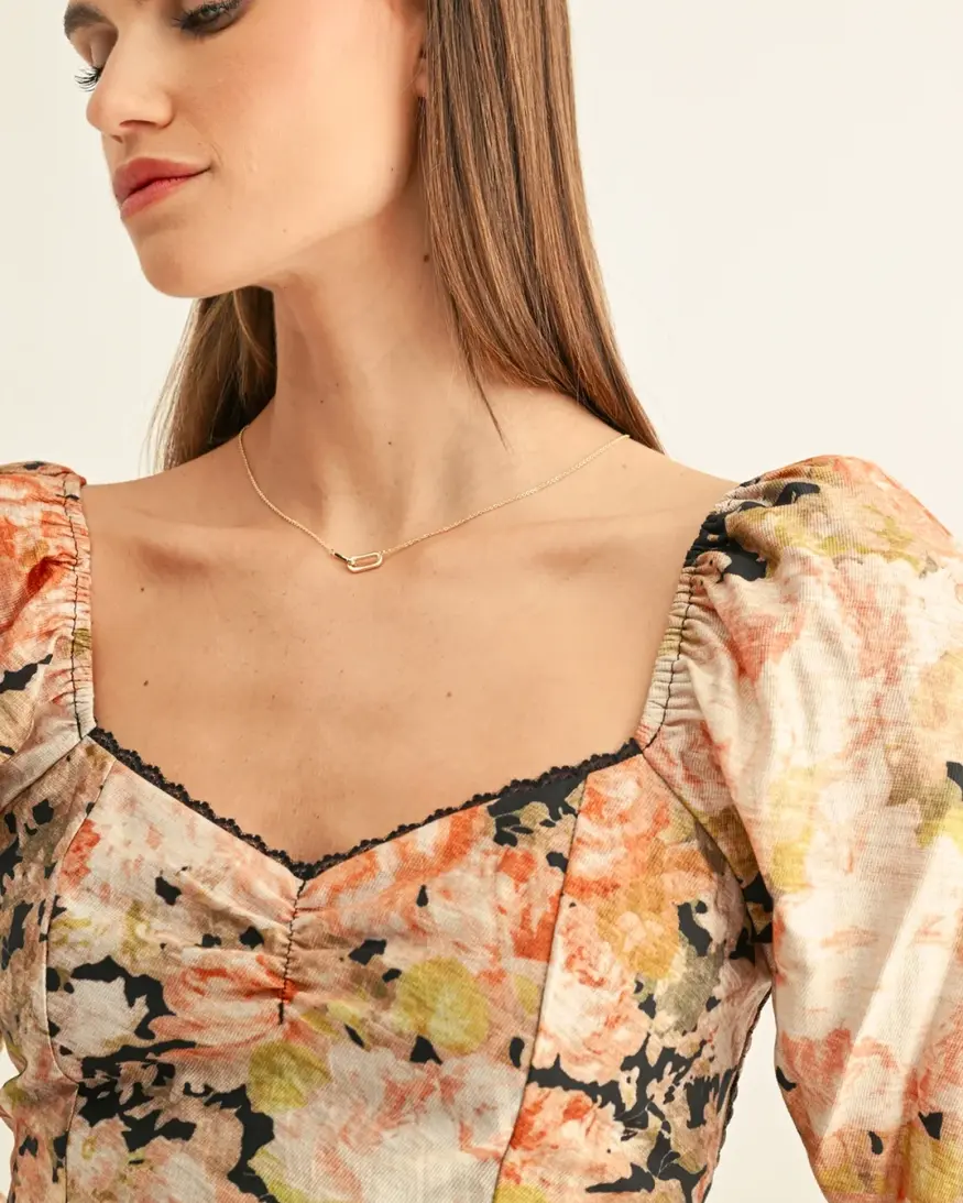 Adelyn Rae Sylvie LS Peplum Top