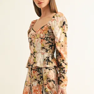 Adelyn Rae Sylvie LS Peplum Top