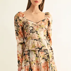 Adelyn Rae Sylvie LS Peplum Top