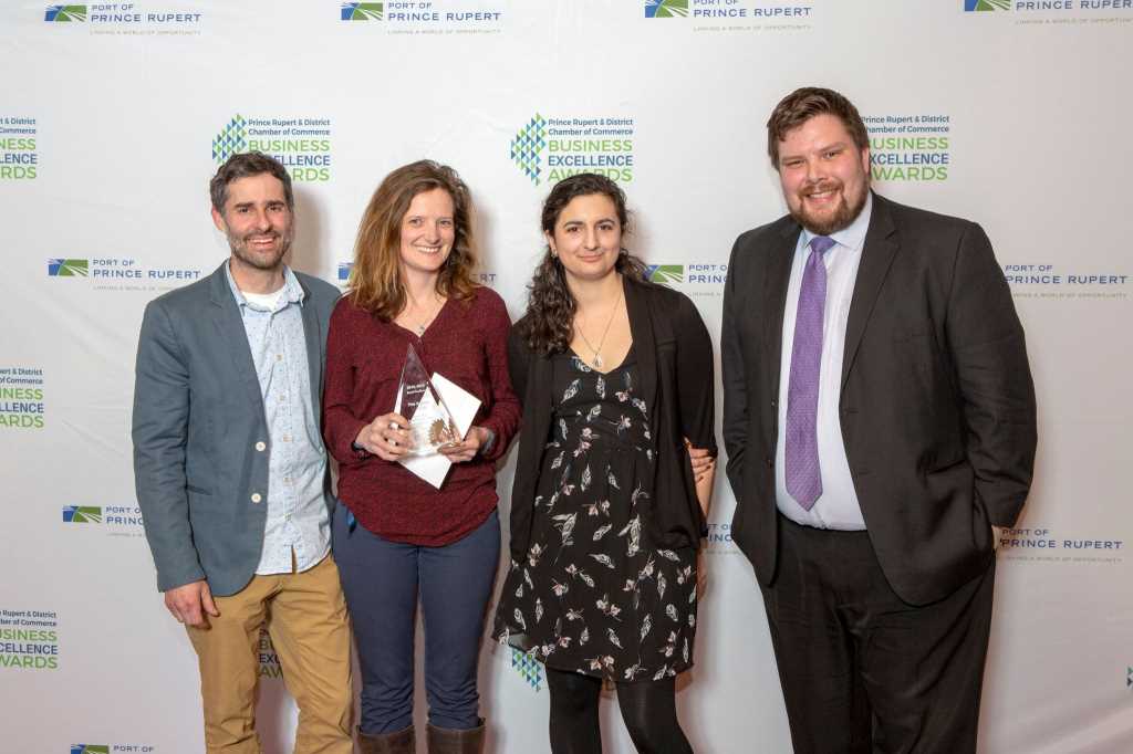 The owners and employee along with the award sponsor at the 2018-2019 Business Excellence Awards