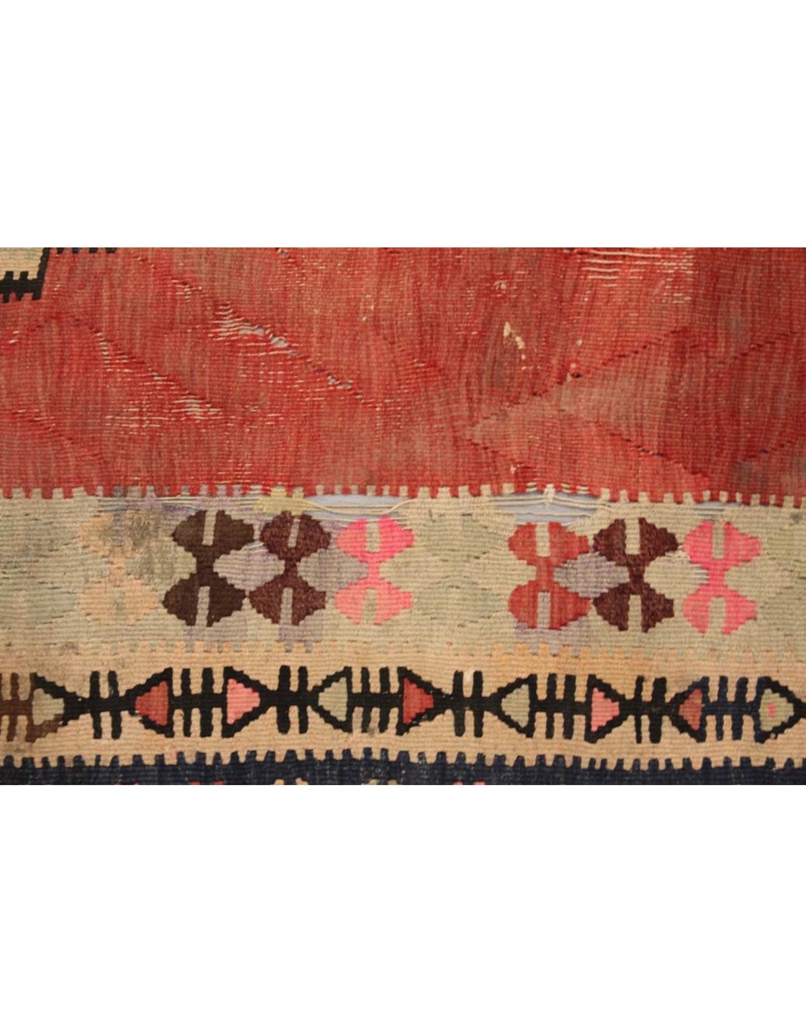 Carpet - 5'4" x 10', flat weave, predominantly red