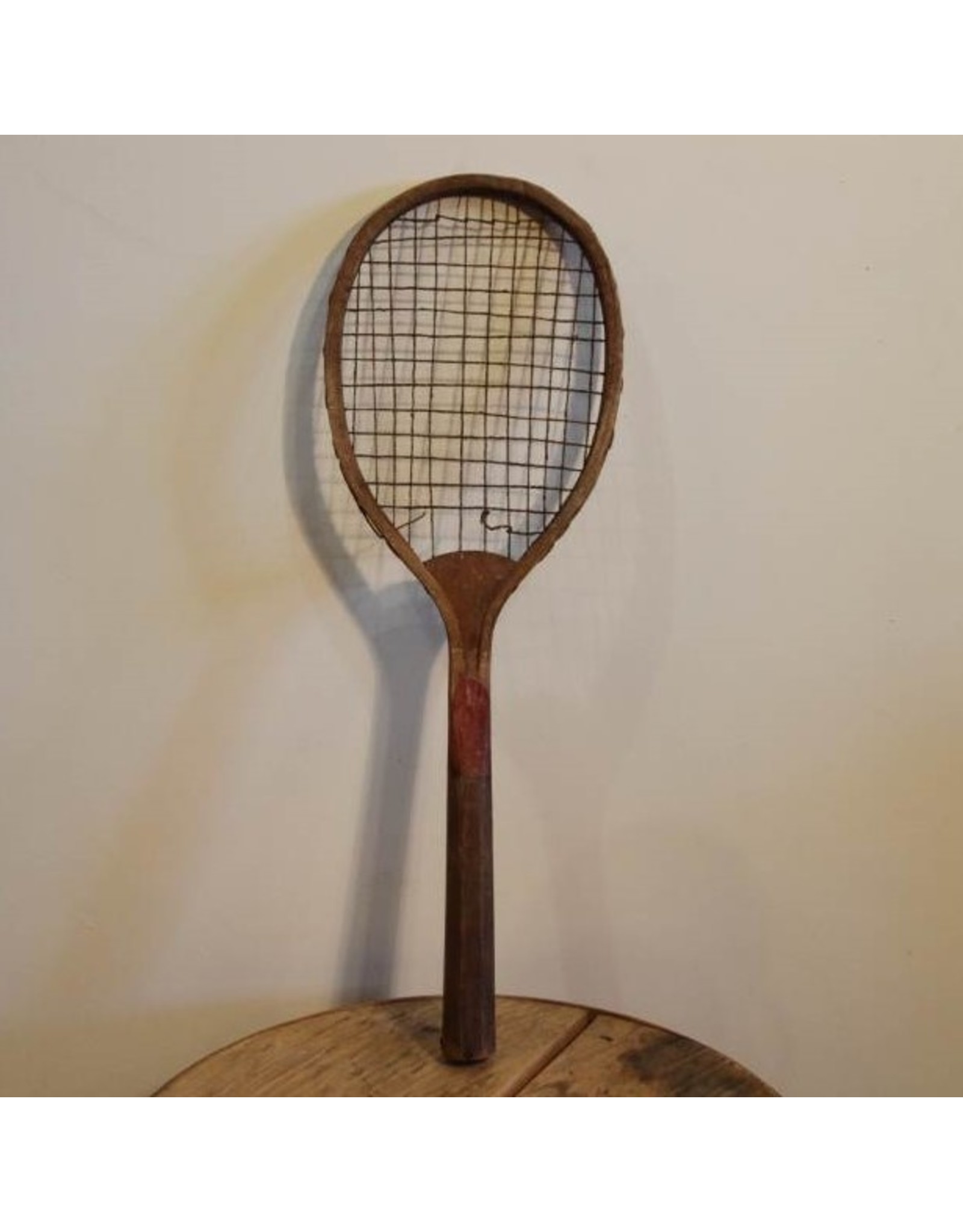 Single old sports racquet