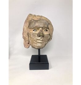 Sculptural mask on stand