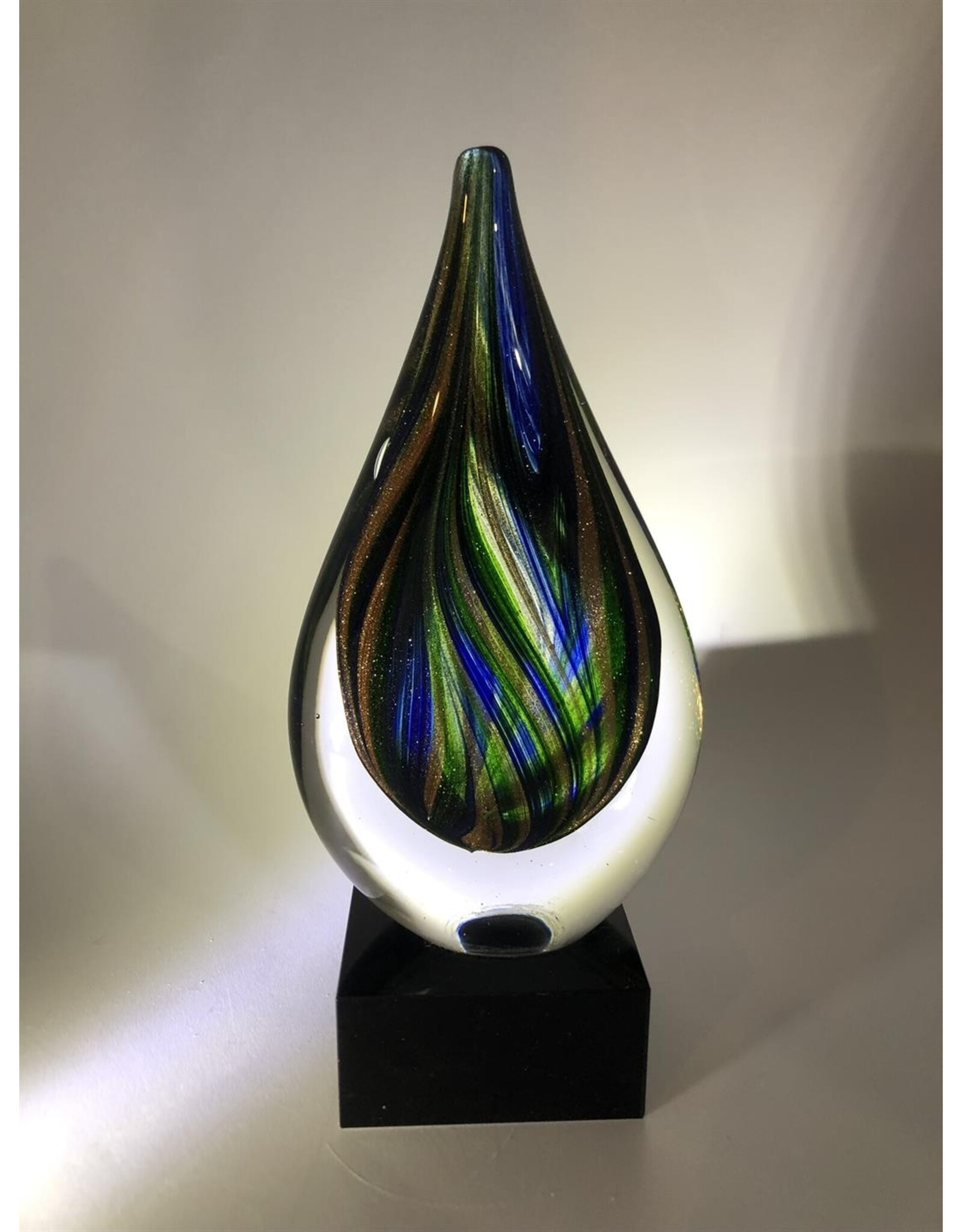 Teardrop art glass on stand