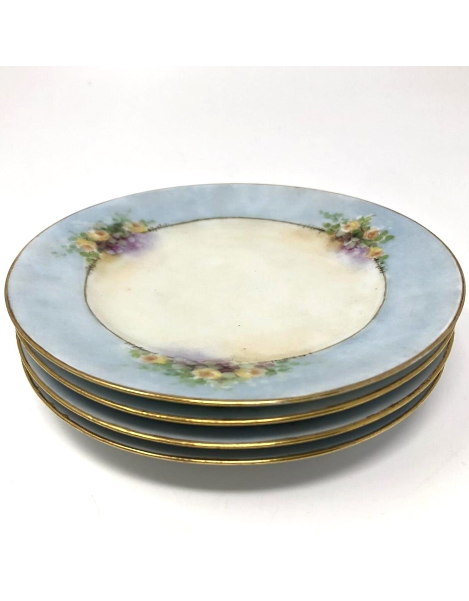 Set of four dessert plates