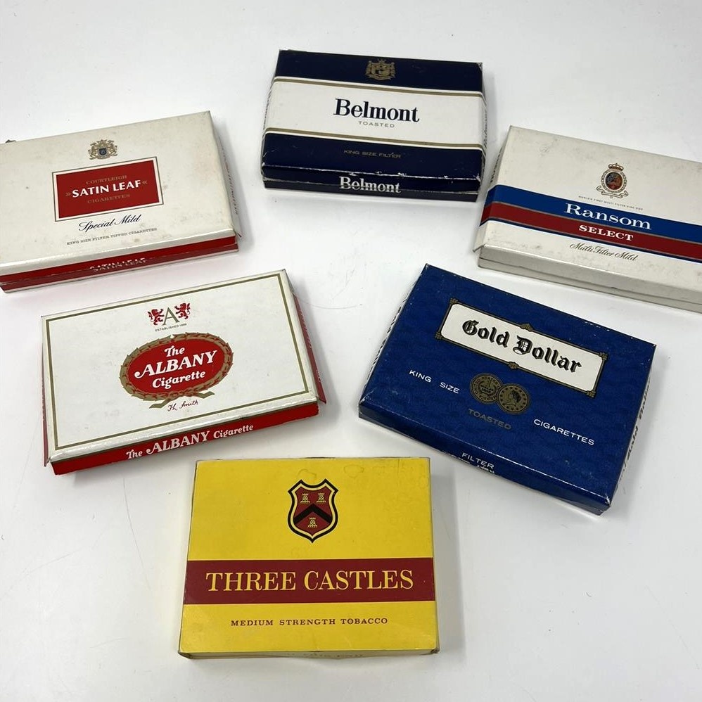 A small collection of assorted vintage cardboard cigarette packages