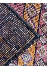 7'.7" x 3' hand knotted wool rug