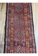 7'.7" x 3' hand knotted wool rug