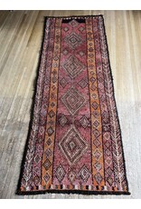 7'.7" x 3' hand knotted wool rug