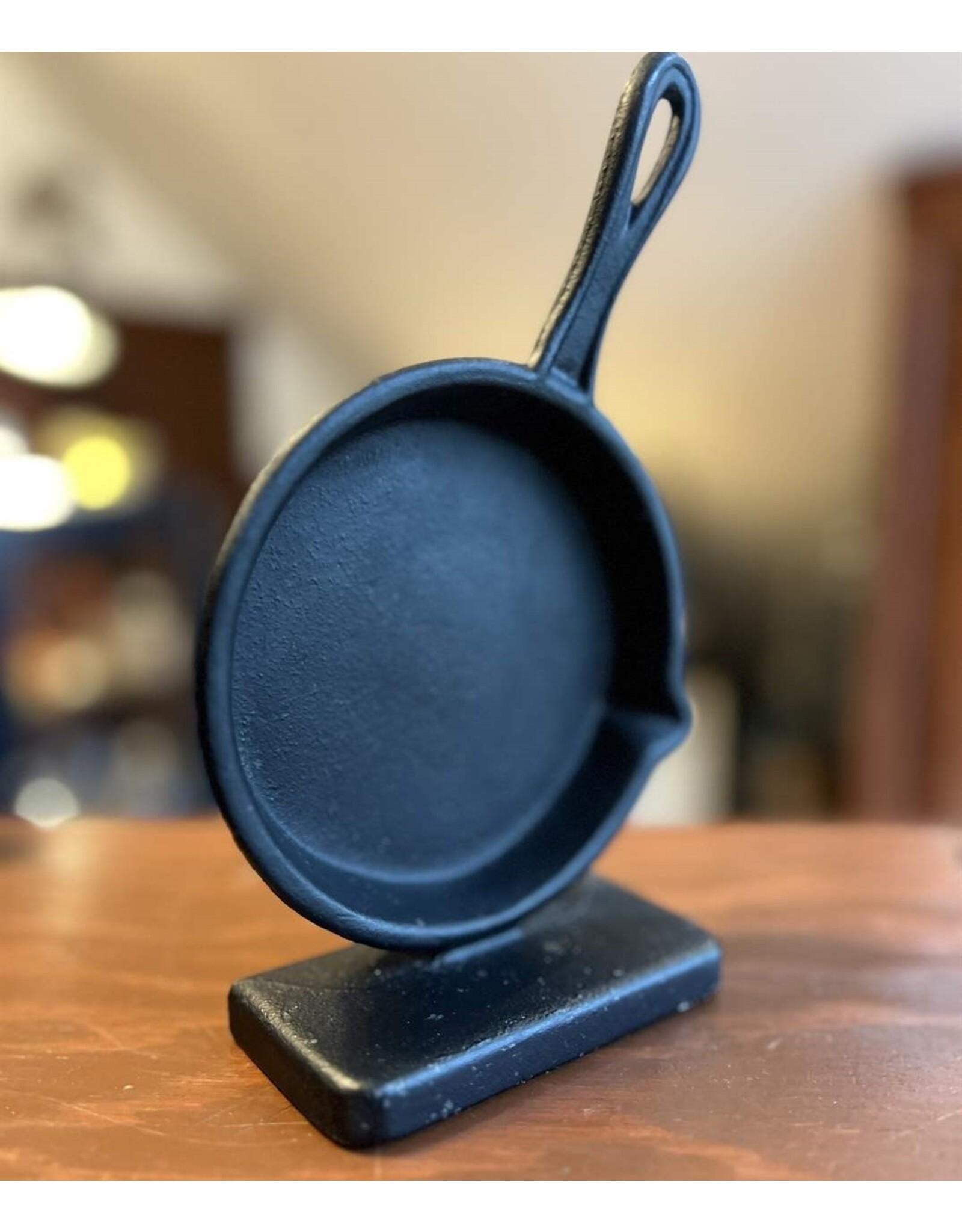 Bookend - cast iron frying pan Robert Emig 1968