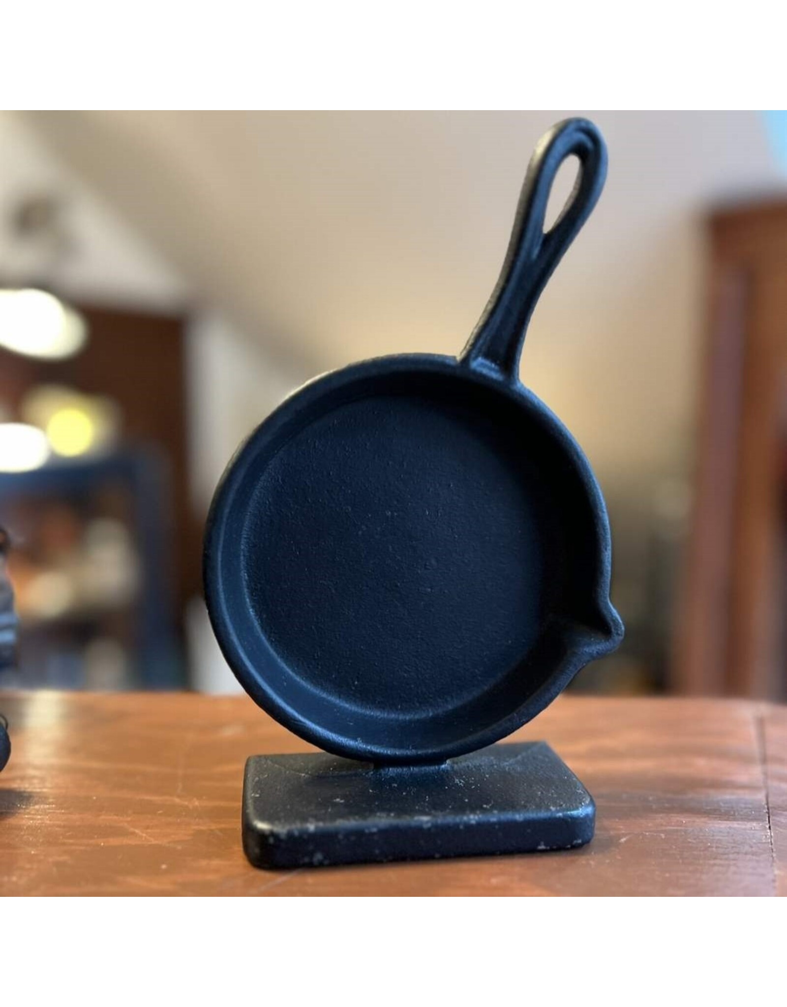 Bookend - cast iron frying pan Robert Emig 1968