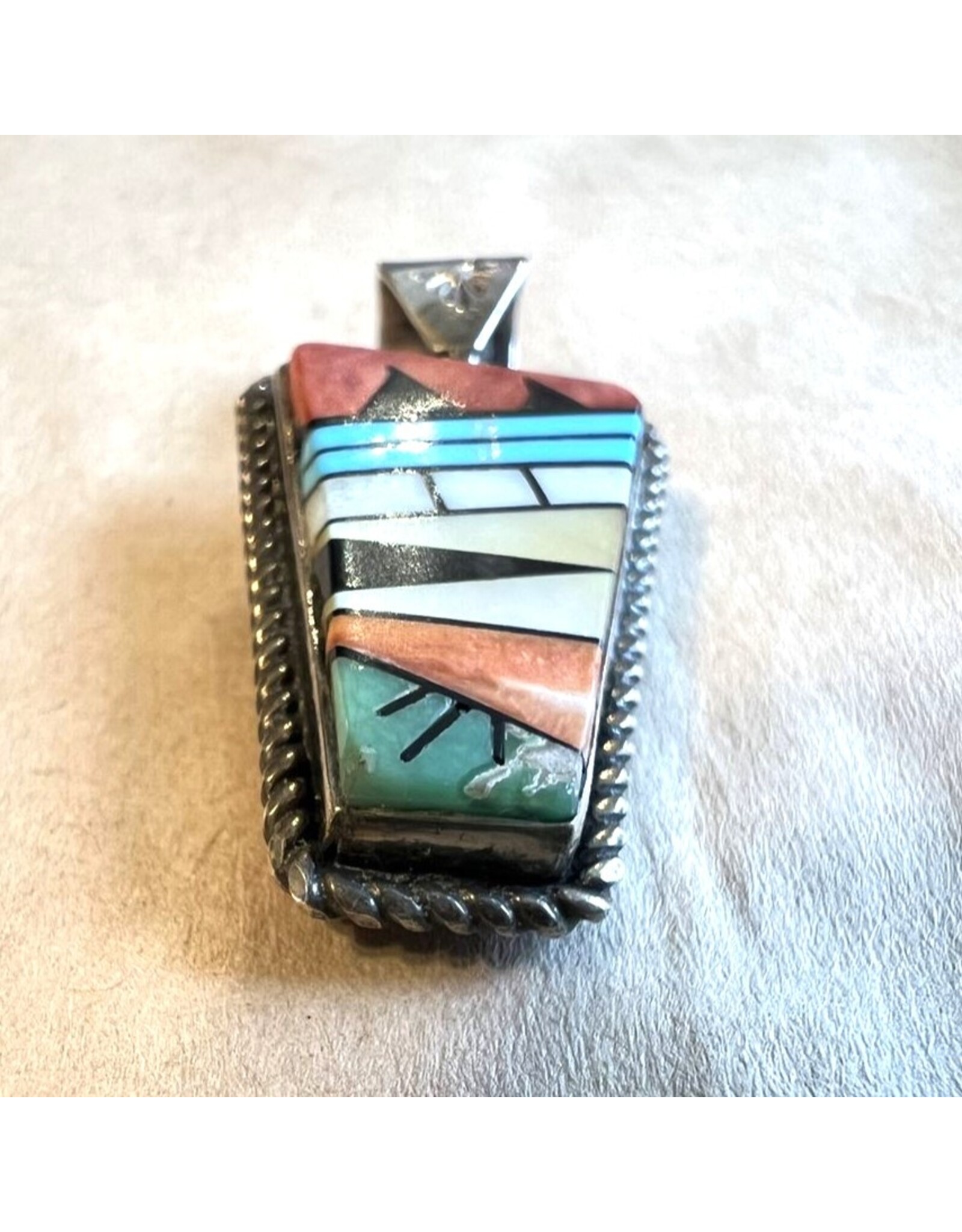 Pendant - Zuni lapidary sterling silver signed Bevis  Tsadiasi spinning