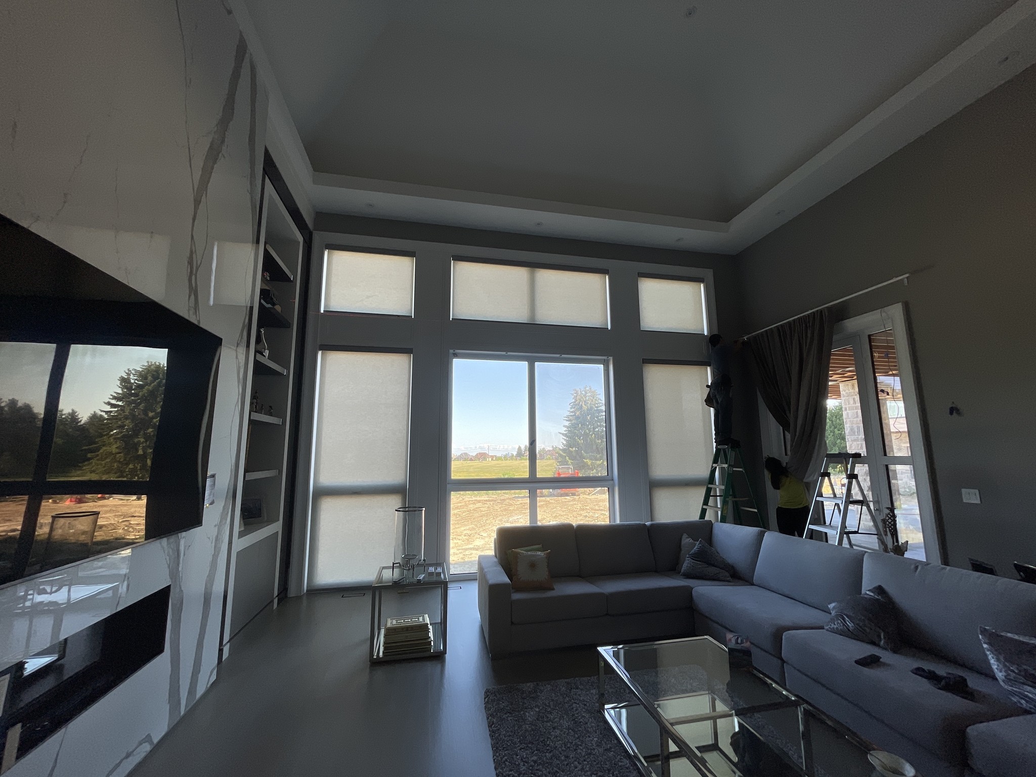 Installation of High Window Shades and Drapes