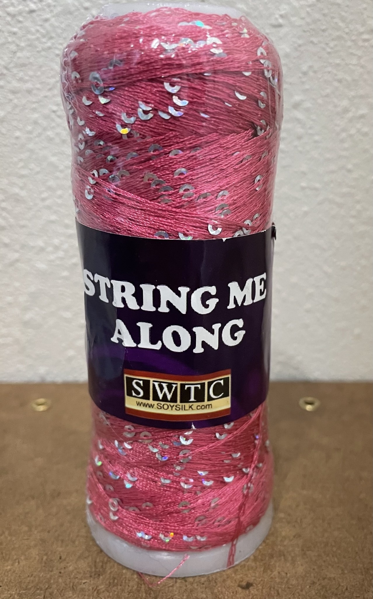 String Me Along Red