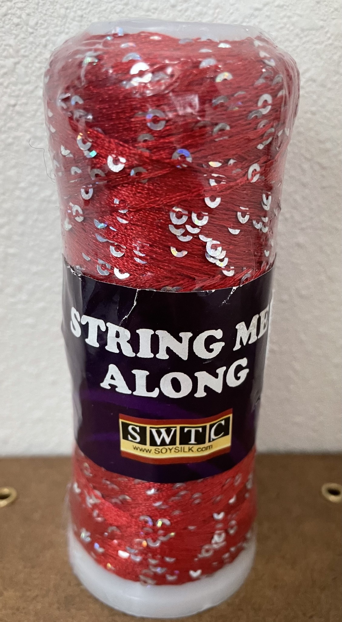 String Me Along Red
