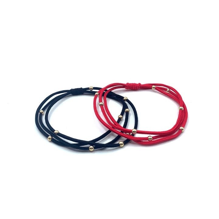 Erin Gray 3mm Gold Water Pony Waterproof Bracelet Hair Bands Set of 2 in Red and Black