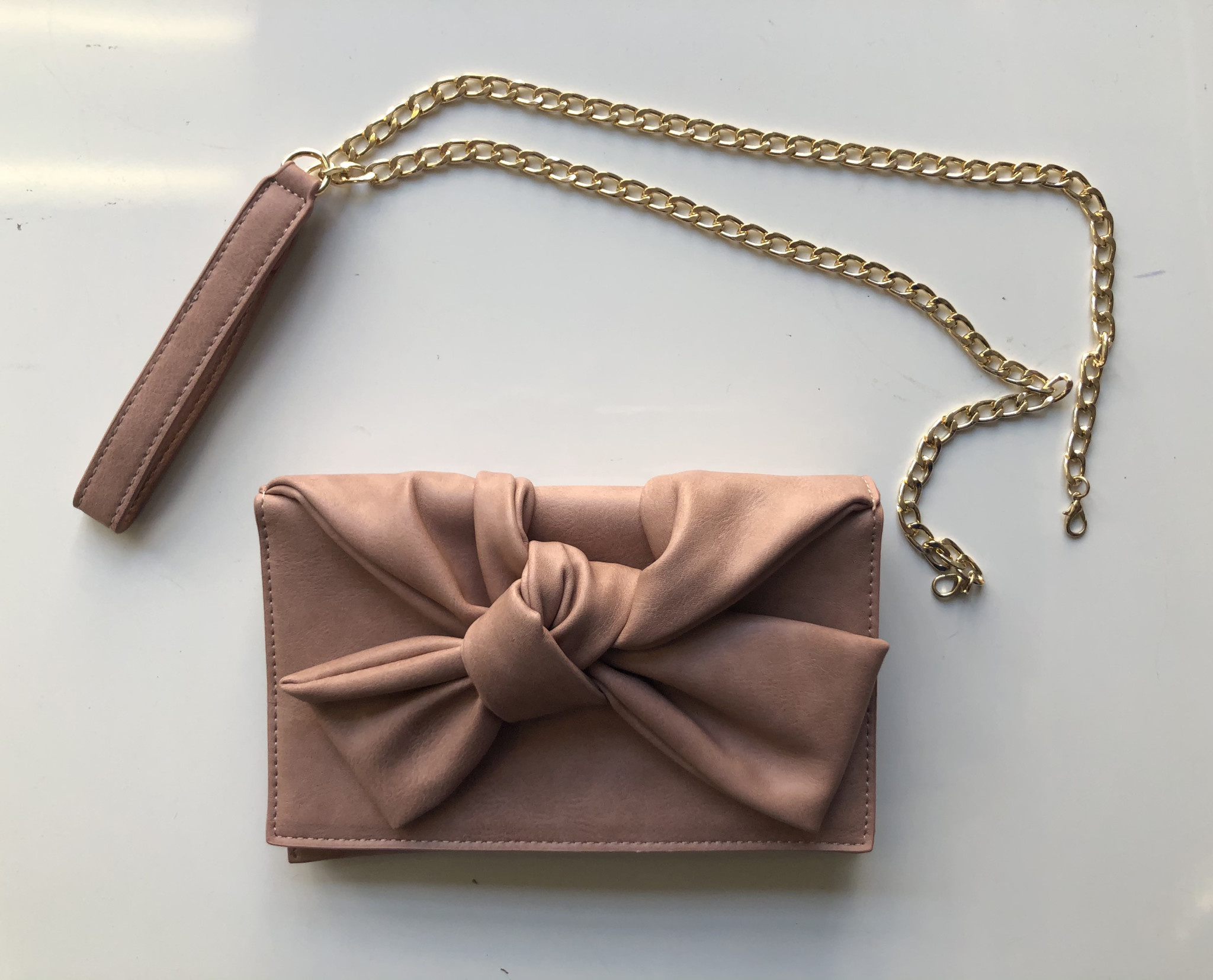 blush leather clutch
