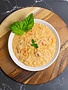 Risotto au pesto de tomates séchées, bisque de homard, crevette & ail confit
