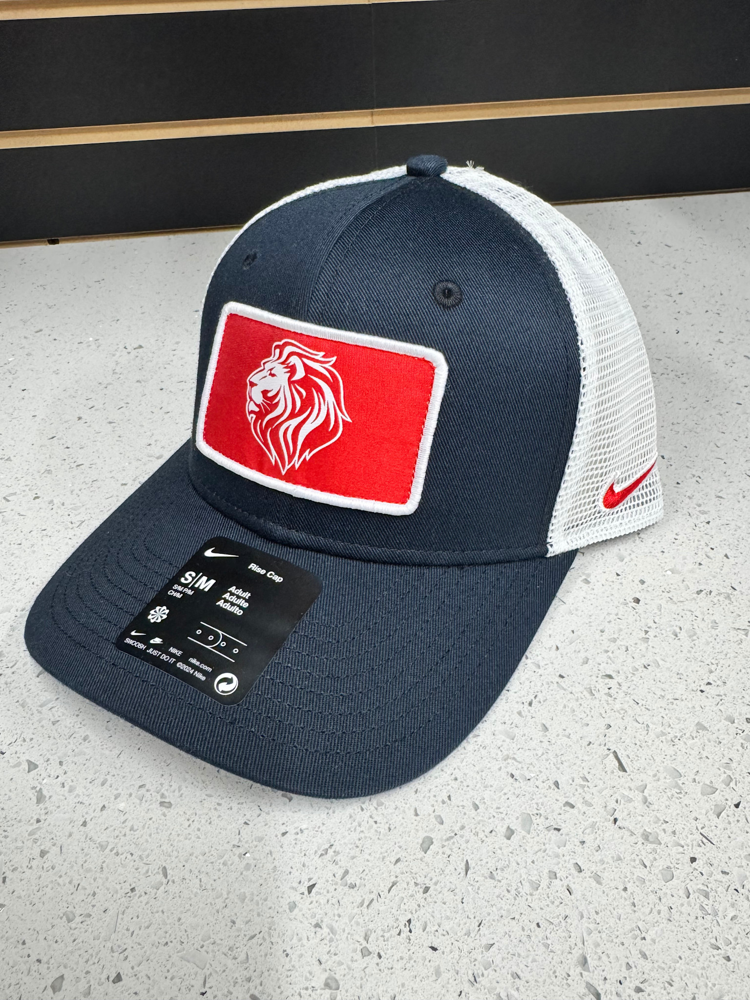 Adult Nike Lion Rise Patch Trucker Hat