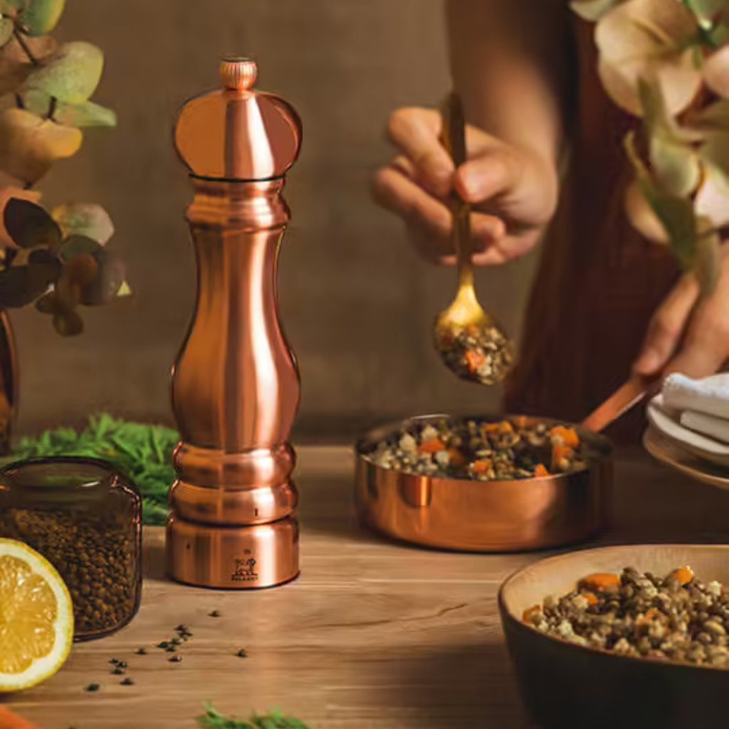 https://cdn.shoplightspeed.com/shops/609791/files/41732678/1024x1024x1/peugeot-paris-uselect-pepper-mill-copper-plated-st.jpg