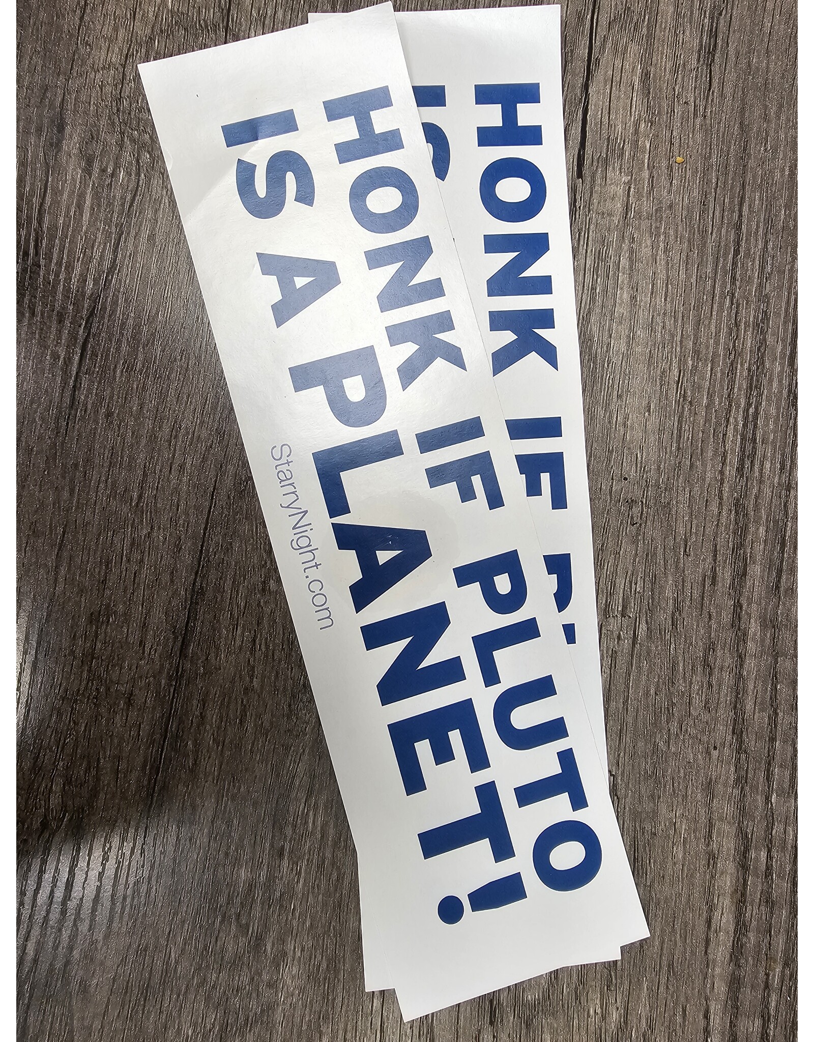 Bumper Sticker: "Honk if Pluto is a Planet!"