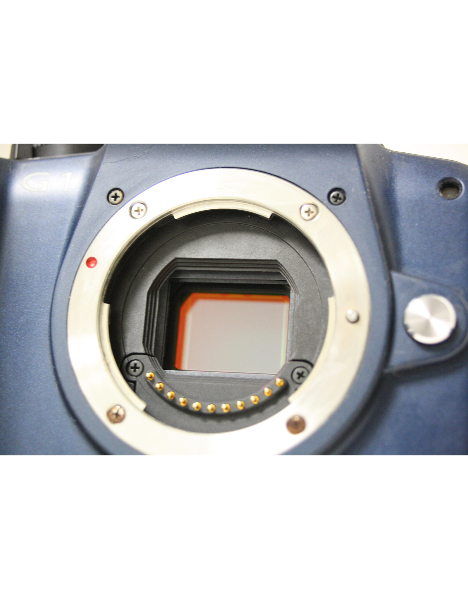 Lumix Lumix G1 with Lumix G Vario 14-45mm f/3.5-5.6 lens, neck strap, battery and charger (Pre-owned)