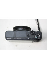 Sony Cyber-shot DSC-RX100 IV(M4) 20.1MP, 2.9x Zoom Compact Digital Camera with Case (Pre-Owned)