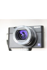 Sony Cyber-shot DSC-RX100 IV(M4) 20.1MP, 2.9x Zoom Compact Digital Camera with Case (Pre-Owned)