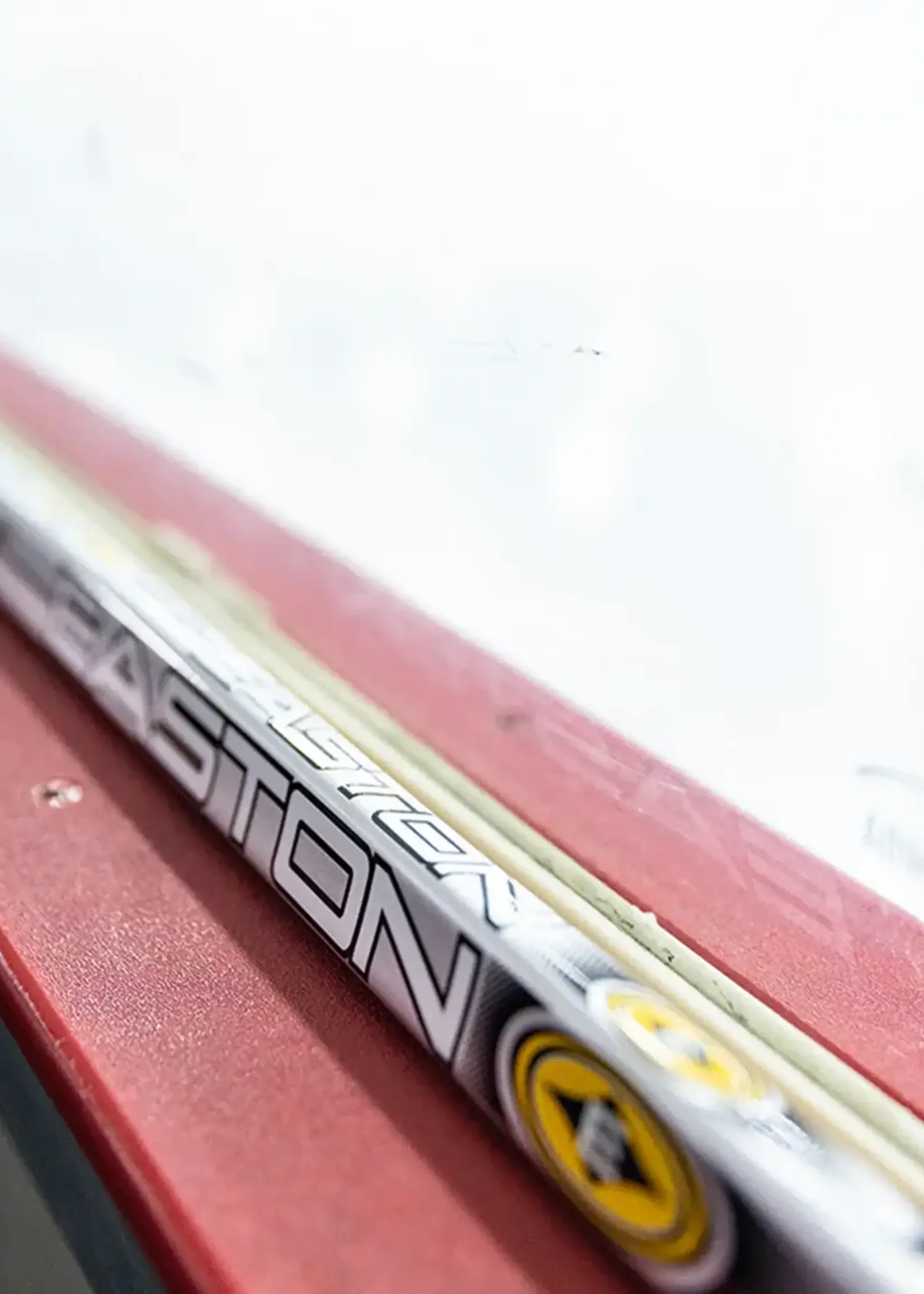 yellow easton synergy hockey stick