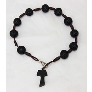 A Black Tau Bracelet with Wood Beads and a Wood Cross.