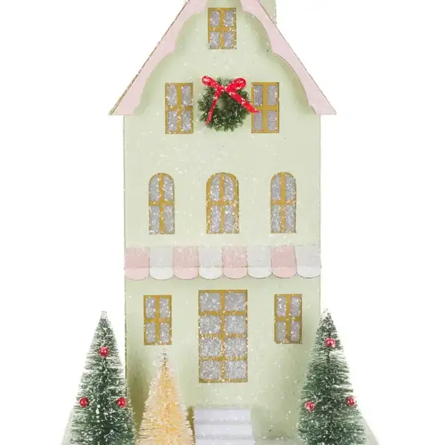 Green Illuminated House Display with Snowy Gold Roof