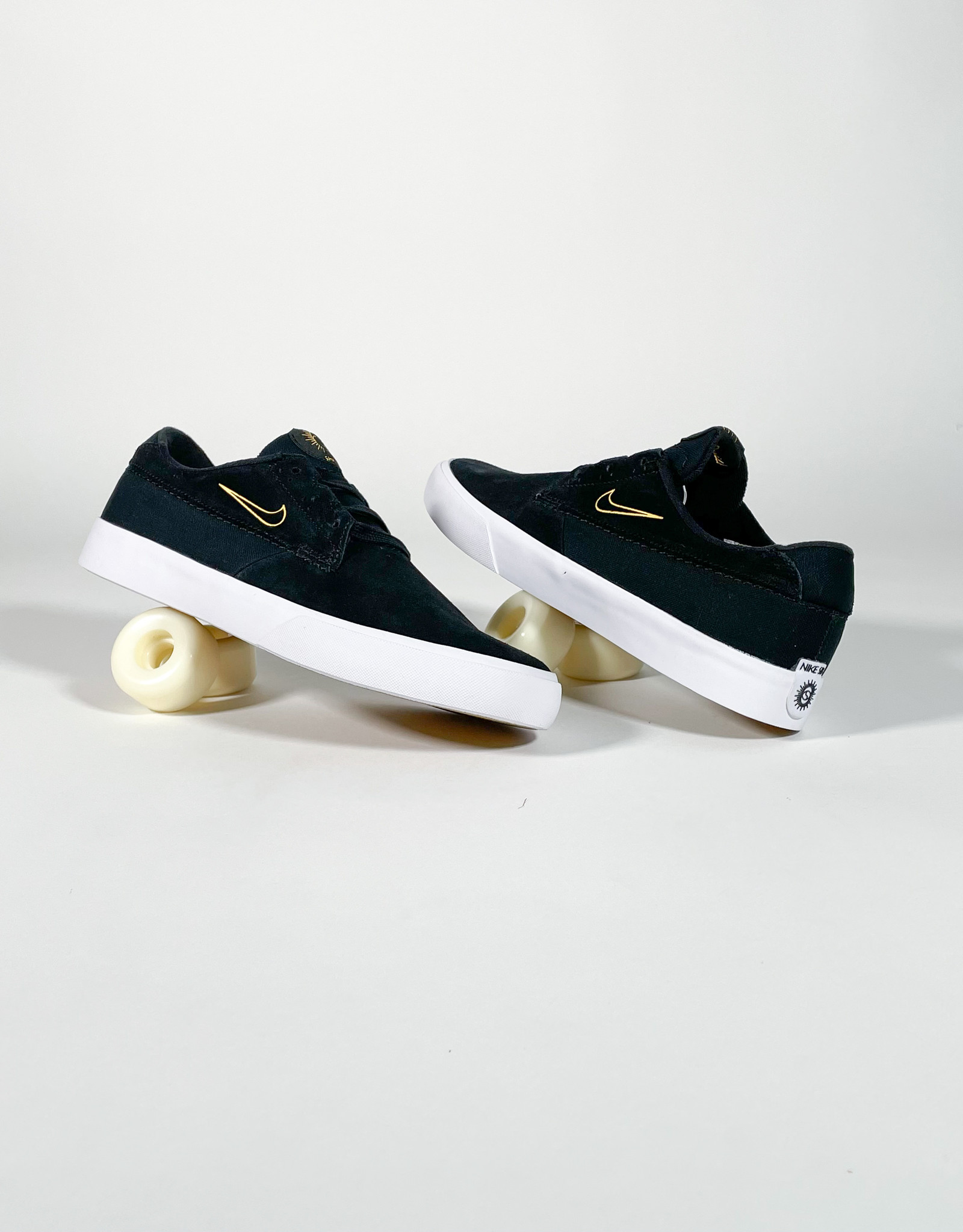 nike sb black and gold