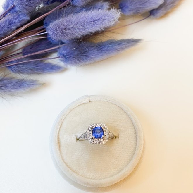Cushion cut sapphire and diamond ring
