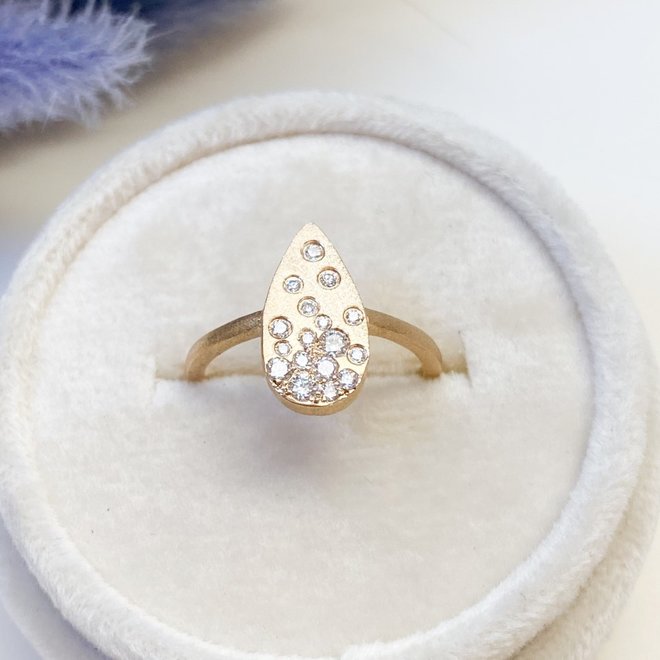 Pear shape gold brushed diamond ring