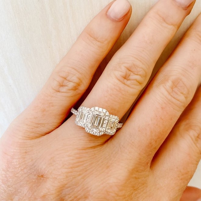 Emerald cut diamond halo ring