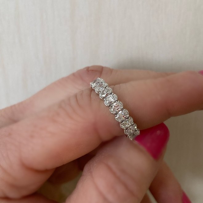 Ten oval diamond ring