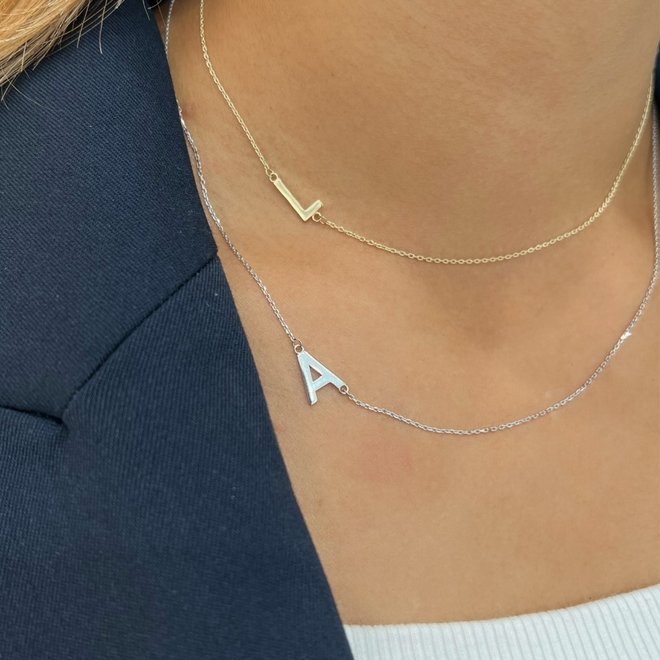 Asymmetrical initial necklace