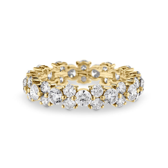 Alternating brilliant cut diamond eternity band