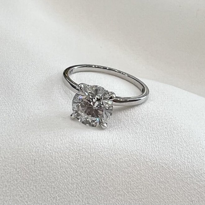 LAB The classic hidden halo diamond solitaire engagement ring