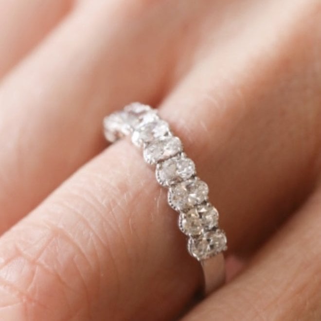 Ten oval diamond ring